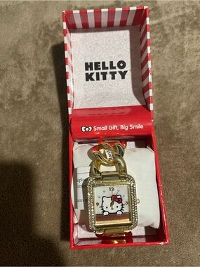 Hello Kitty Gold-tone Watch with White Dial and Red Bow